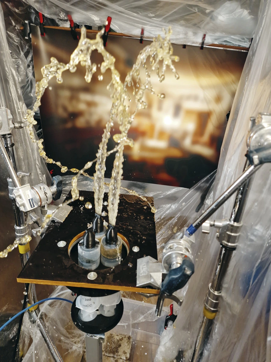 Liquid splash rig setup for tabletop food and beverage slow-motion testing.